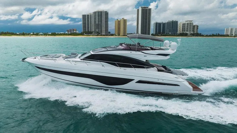 Slide: The Image of 2022 Princess S66 yacht cruising on ocean near city skyline. - 18