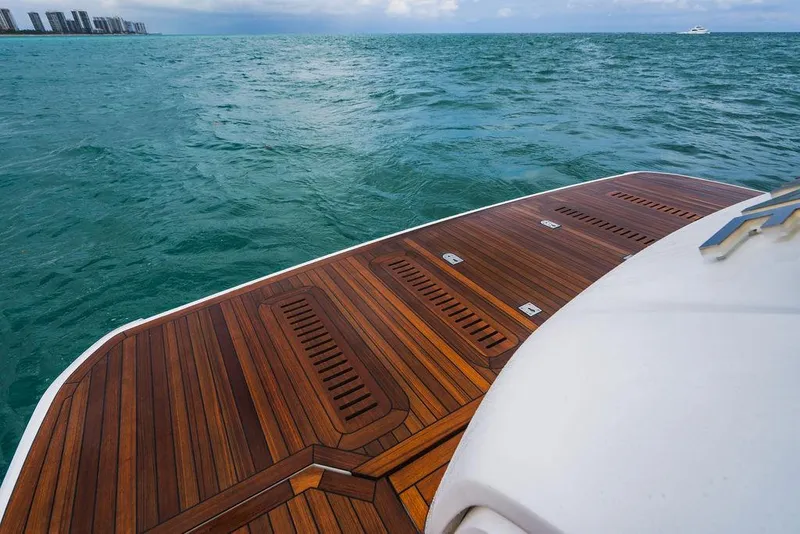Slide: The Image of Luxury yacht Princess S66 2022 with elegant wooden deck on open sea. - 29