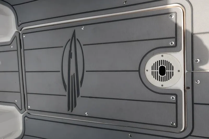 Slide: The Image of 2020 Chaparral 21 Surf boat deck with sleek design and integrated speaker. - 16