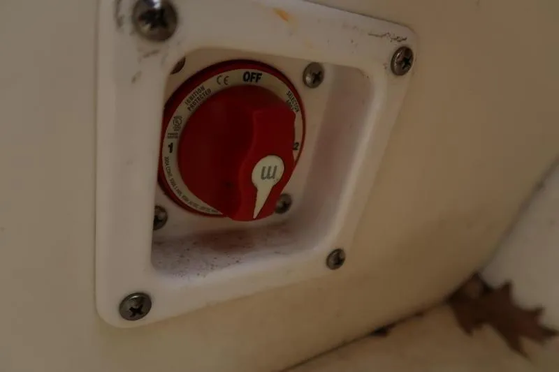 Slide: The Image of Red switch on a 2020 Chaparral 21 Surf boat control panel. - 7