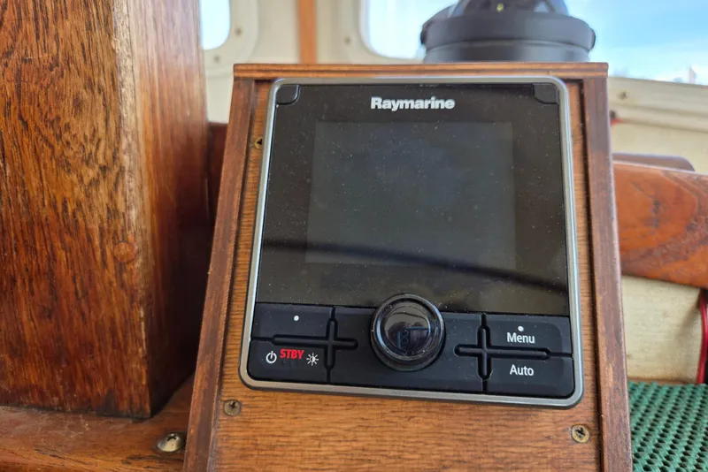 Slide: The Image of Raymarine navigation system on 1973 Willard Marine Vega Nomad Flybridge boat. - 25