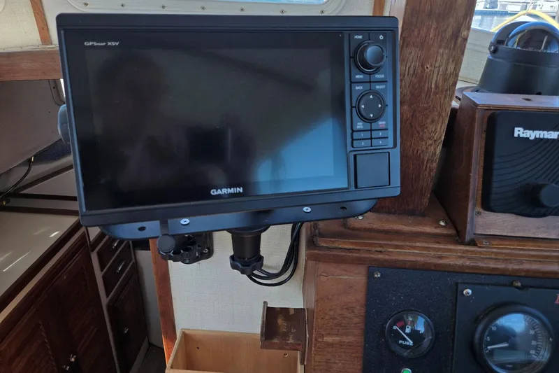 Slide: The Image of 1973 Willard Marine Vega Nomad Flybridge with Garmin GPS and Raymarine equipment. - 26