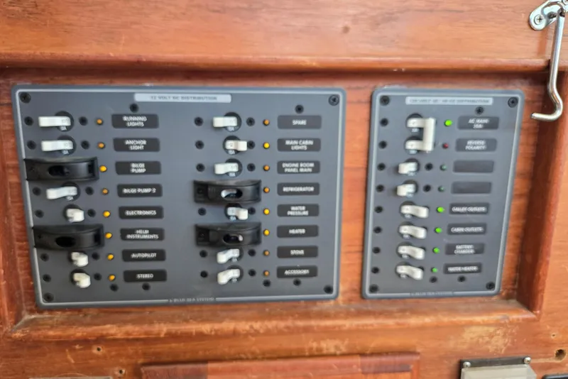 Slide: The Image of Control panel of a 1973 Willard Marine Vega Nomad Flybridge boat. - 27
