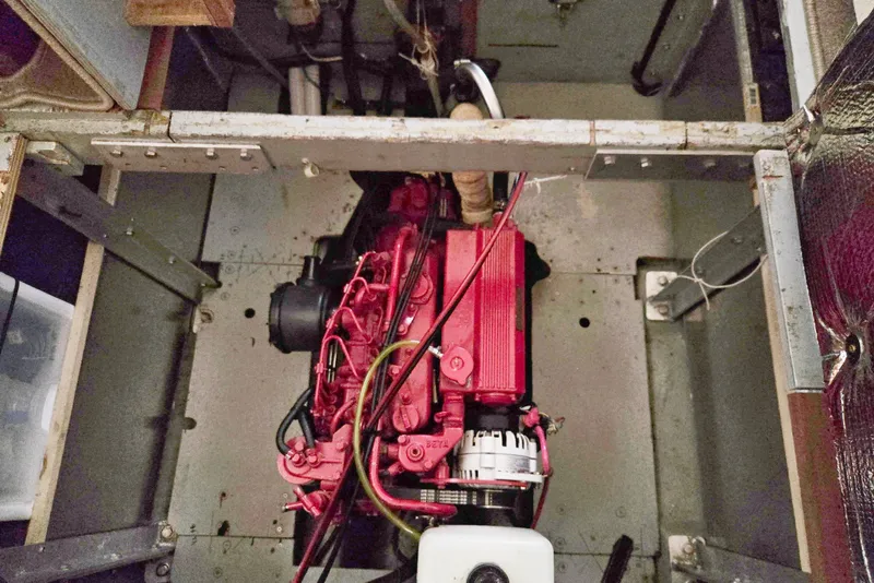 Slide: The Image of Engine compartment of a 1973 Willard Marine Vega Nomad Flybridge boat. - 28