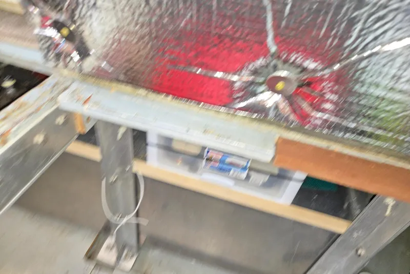 Slide: The Image of Interior view of a 1973 Willard Marine Vega Nomad Flybridge with metallic insulation. - 32