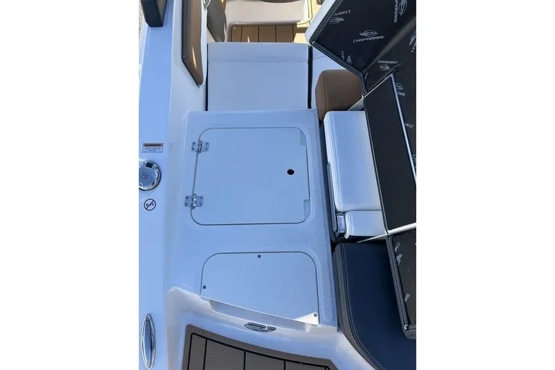 Slide: The Image of 2026 Chaparral 21 SSi boat interior with storage compartments and seating. - 11