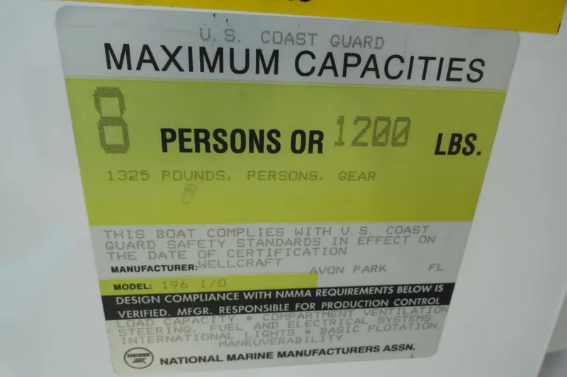 Slide: The Image of 1995 Wellcraft Eclipse 196 S capacity label, U.S. Coast Guard compliance, 8 persons or 1200 lbs. - 9