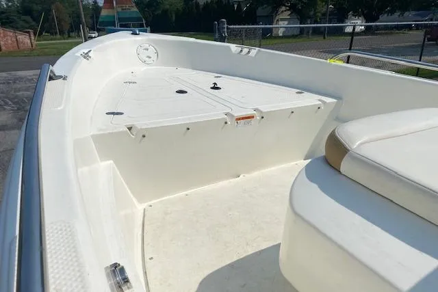 Slide: The Image of 2015 Triumph 170 CC boat interior with seating and storage compartments. - 3