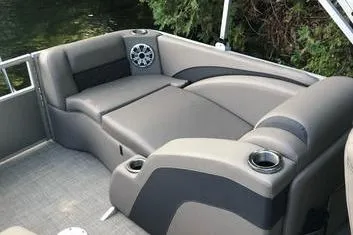 Slide: The Image of 2019 Bennington 22 SCWXP boat interior with gray seating and cup holders. - 31