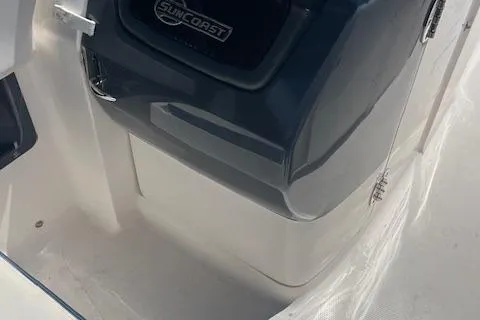 Slide: The Image of 2019 Chaparral 250 Suncoast boat engine detail, featuring sleek design and Suncoast branding. - 12