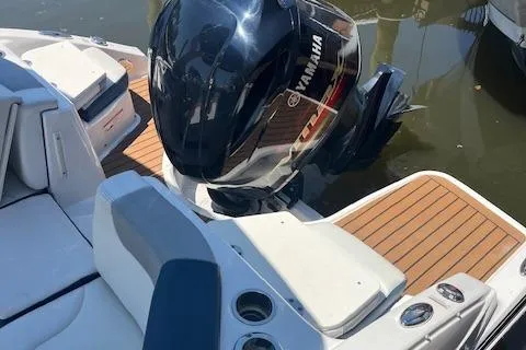 Slide: The Image of 2019 Chaparral 250 Suncoast boat with Yamaha outboard engine and teak swim platform. - 5