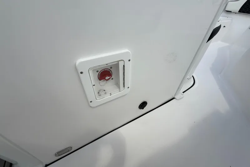 Slide: The Image of 2026 Tidewater 232 LXF boat interior with control panel and sleek white finish. - 30