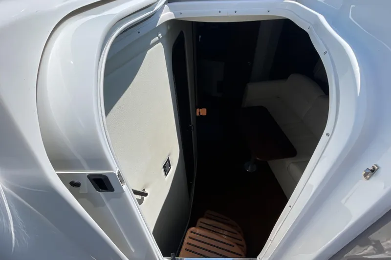 Slide: The Image of Luxurious interior of 2017 Rinker EX 370 yacht with elegant seating and modern amenities. - 23