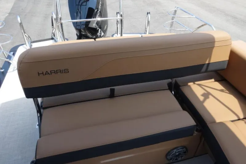 Slide: The Image of 2026 Harris Grand Mariner 250 boat seating with tan upholstery and sleek design. - 10