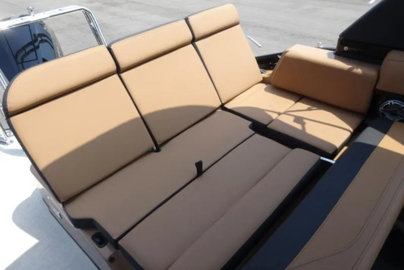 Slide: The Image of Luxurious seating on 2026 Harris Grand Mariner 250 boat, featuring tan upholstery and sleek design. - 18