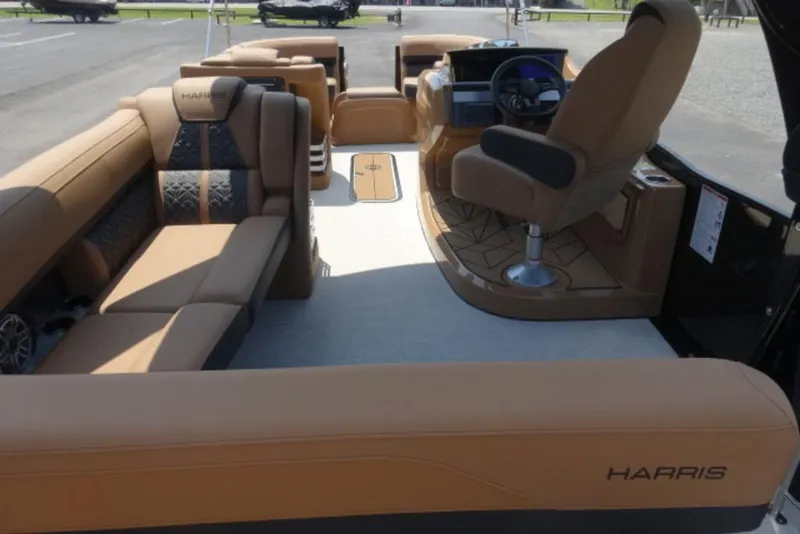 Slide: The Image of 2026 Harris Grand Mariner 250 interior with luxurious seating and modern helm design. - 19