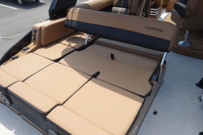Slide: The Image of 2026 Harris Grand Mariner 250 boat with tan seating and adjustable backrest. - 20
