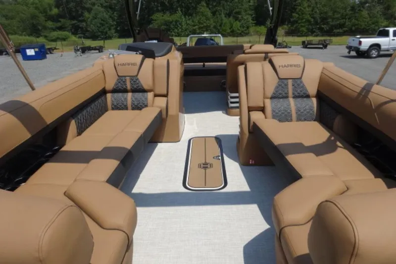 Slide: The Image of Luxurious interior of 2026 Harris Grand Mariner 250 pontoon boat with tan seating. - 5