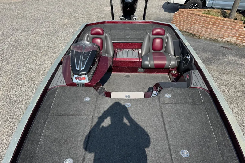 Slide: The Image of 2014 Ranger Z521 Comanche boat interior with dual seats and steering console. - 11
