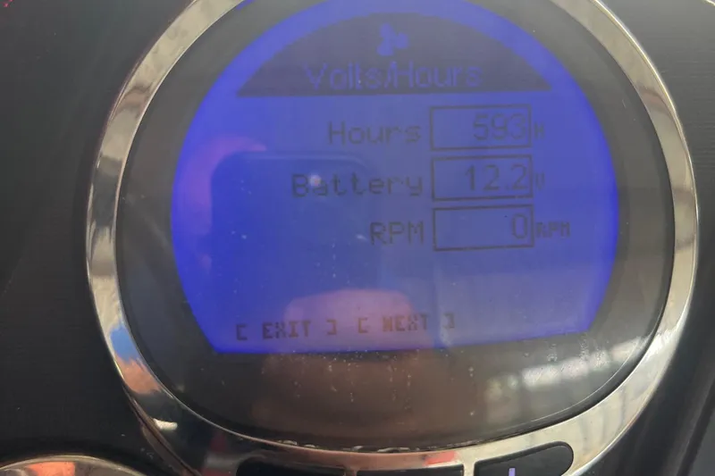 Slide: The Image of Digital display showing 593 hours, 12.2V battery, 0 RPM on Ranger Z521 Comanche. - 20