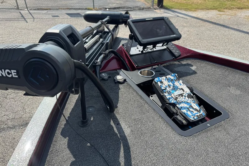Slide: The Image of 2014 Ranger Z521 Comanche boat with Lowrance electronics and camo-patterned accessory on deck. - 8