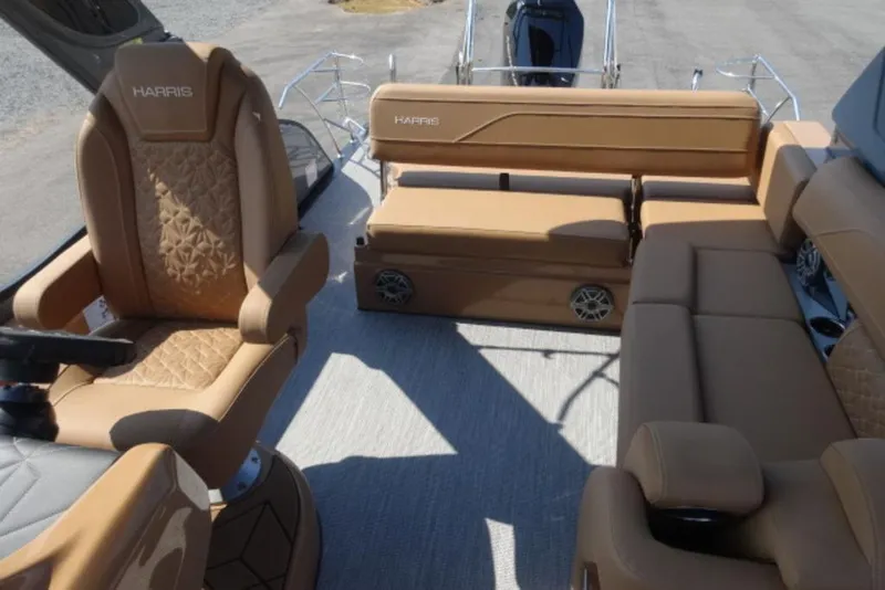 Slide: The Image of Luxurious interior of 2026 Harris Grand Mariner 250 pontoon boat with tan seating. - 7