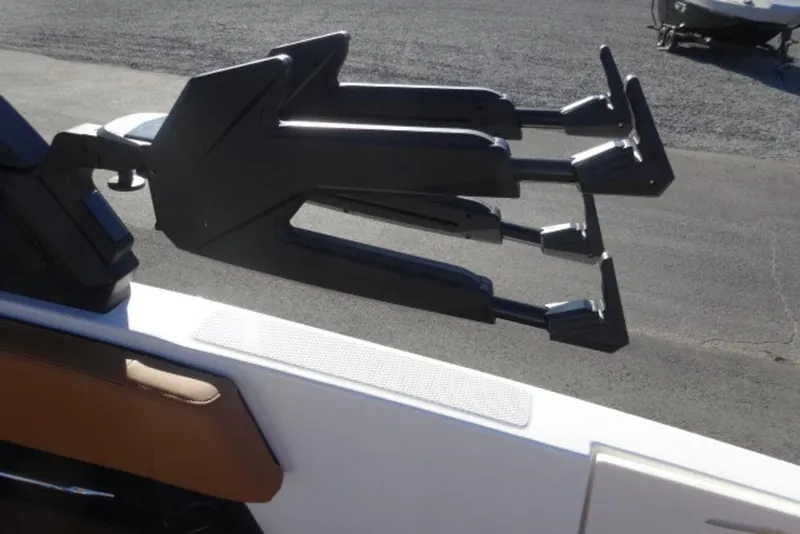 Slide: The Image of 2026 Chaparral 30 Surf boat with advanced wakeboard rack system. - 12