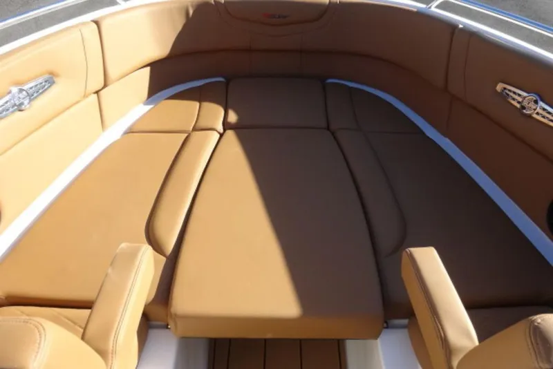 Slide: The Image of Luxurious tan seating on 2026 Chaparral 30 Surf boat interior. - 23