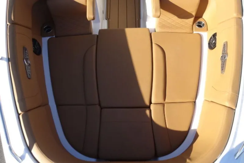 Slide: The Image of 2026 Chaparral 30 Surf boat interior with tan leather seating and modern design. - 26