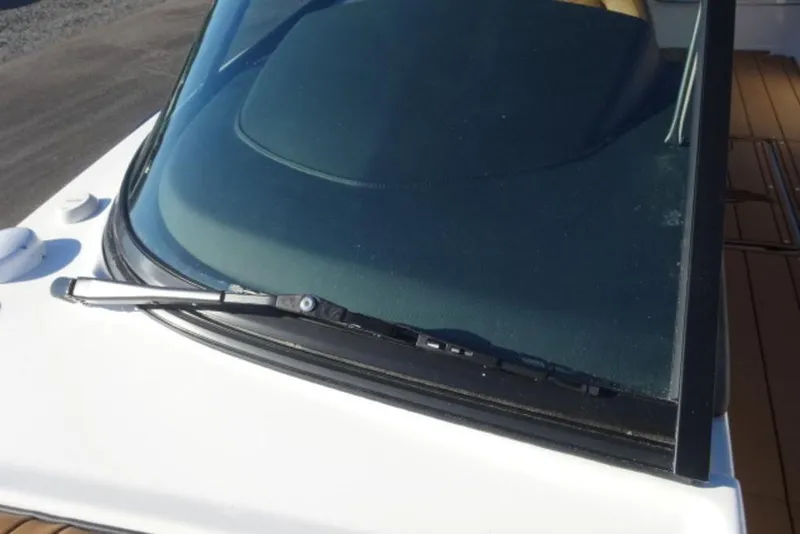 Slide: The Image of Windshield of 2026 Chaparral 30 Surf boat with wiper, close-up view. - 27