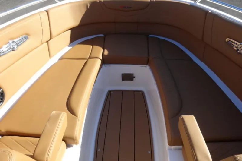 Slide: The Image of Luxurious seating area on 2026 Chaparral 30 Surf boat with tan upholstery. - 29