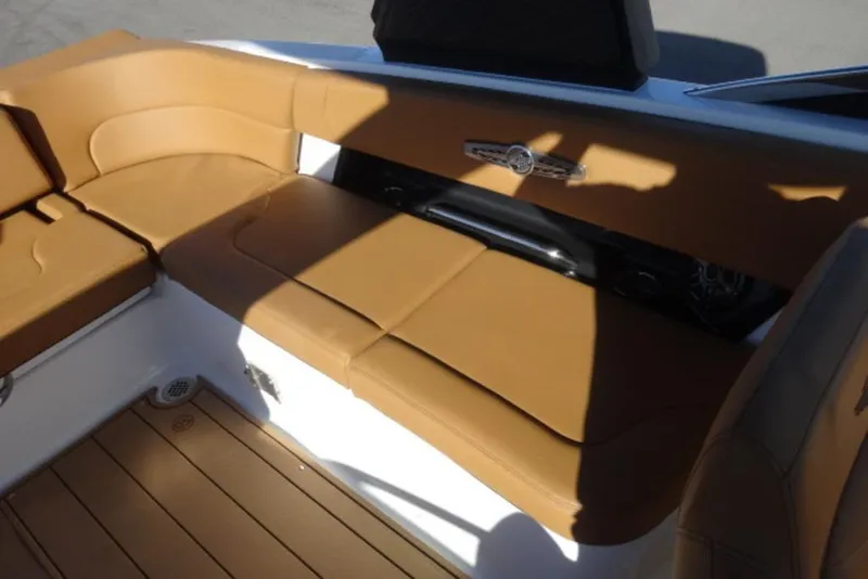 Slide: The Image of 2026 Chaparral 30 Surf boat interior with tan leather seating and stylish design. - 7