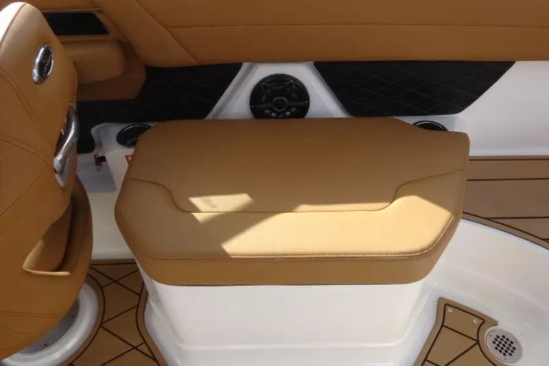 Slide: The Image of 2026 Chaparral 6 GTS boat interior with tan seating and modern design. - 16