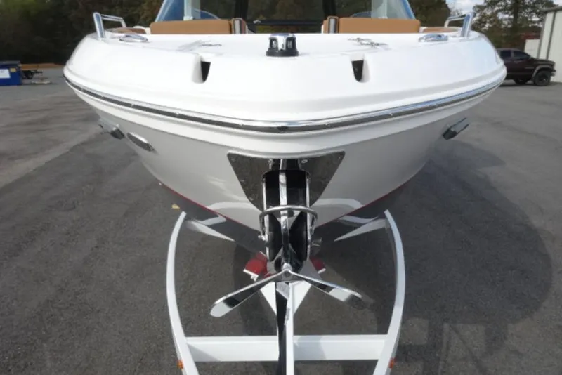Slide: The Image of 2026 Chaparral 6 GTS boat on trailer, front view, outdoors. - 36