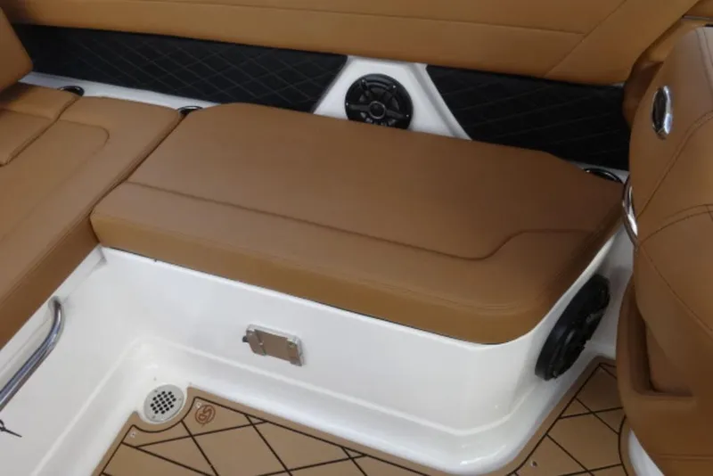 Slide: The Image of 2026 Chaparral 6 GTS boat interior with tan seating and modern design elements. - 6