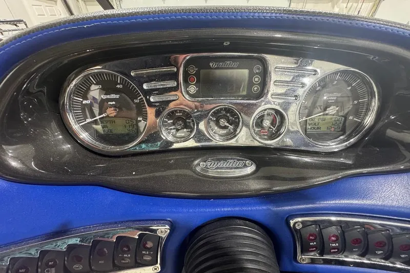 Slide: The Image of Dashboard of a 2007 Malibu Wakesetter 23 LSV boat with gauges and controls. - 20