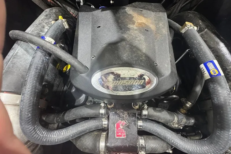 Slide: The Image of Engine of 2007 Malibu Wakesetter 23 LSV with hoses and components visible. - 32