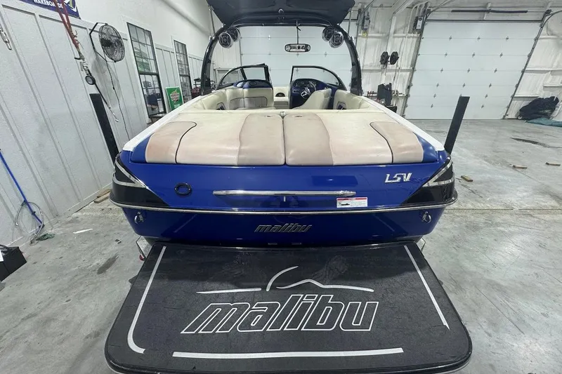 Slide: The Image of 2007 Malibu Wakesetter 23 LSV boat in a garage, rear view. - 6