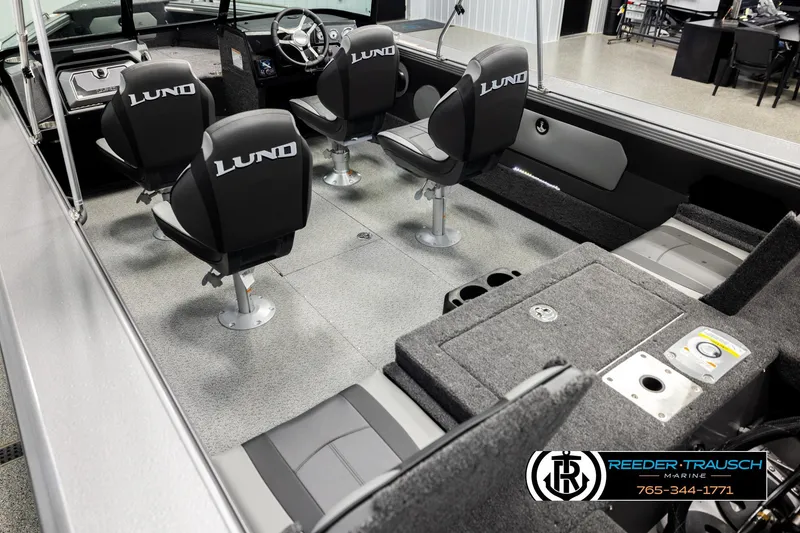 Slide: The Image of 2026 Lund 1975 Tyee boat interior with four seats and modern dashboard. - 10