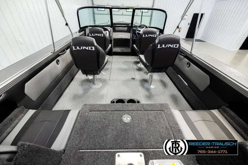 Slide: The Image of Interior of 2026 Lund 1975 Tyee boat with four seats and modern design. - 12