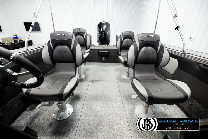 Slide: The Image of Interior of 2026 Lund 1975 Tyee boat with four cushioned seats. - 17