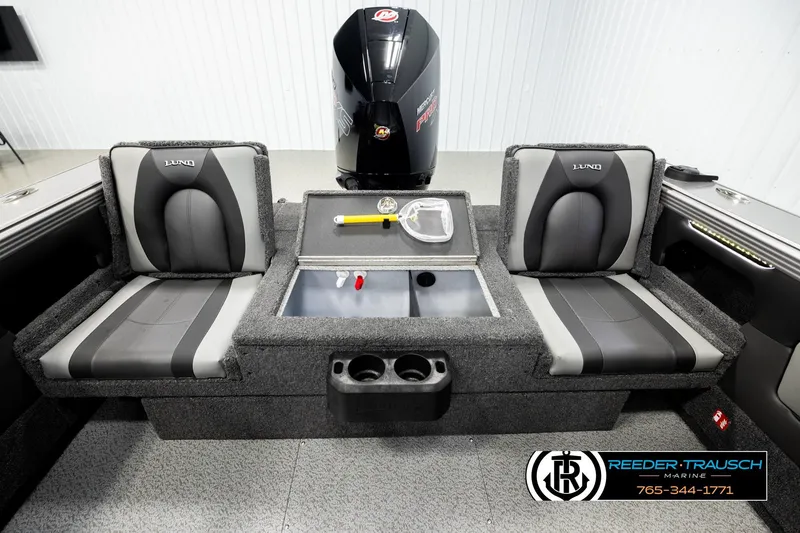 Slide: The Image of Interior of 2026 Lund 1975 Tyee boat with seating and storage compartments. - 19