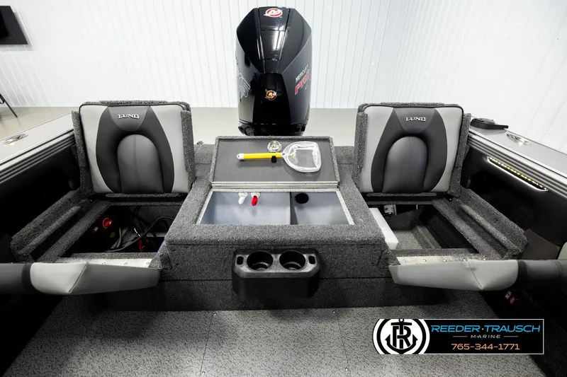 Slide: The Image of Interior of 2026 Lund 1975 Tyee boat with seating and storage compartments. - 20