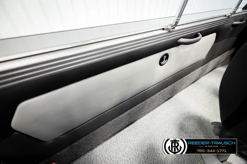 Slide: The Image of Interior view of 2026 Lund 1975 Tyee boat, featuring sleek paneling and modern design. - 26