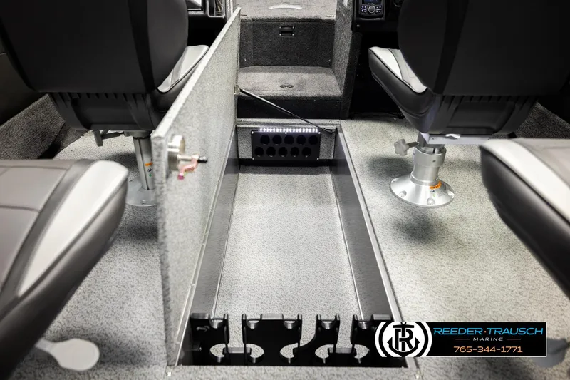 Slide: The Image of Interior of 2026 Lund 1975 Tyee boat with seating and storage compartments. - 29