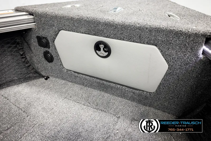 Slide: The Image of Interior of 2026 Lund 1975 Tyee boat with carpeted storage compartment. - 32