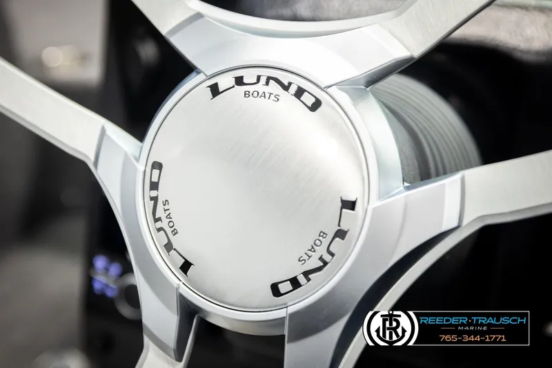 Slide: The Image of Steering wheel of 2026 Lund 1975 Tyee boat, featuring sleek metallic design. - 38
