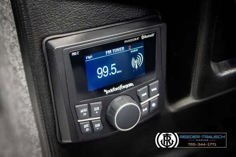 Slide: The Image of Rockford Fosgate PMX-2 stereo system in 2026 Lund 1975 Tyee boat, displaying FM tuner. - 39