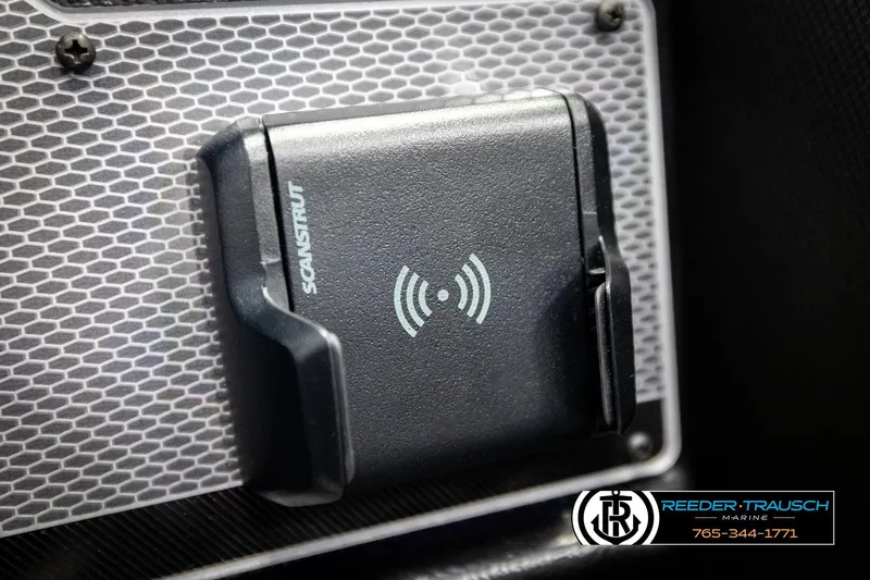 Slide: The Image of Close-up of a Scanstrut wireless charging mount on a 2026 Lund 1975 Tyee boat. - 42