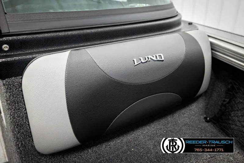 Slide: The Image of Lund 1975 Tyee 2026 boat interior detail with logo and upholstery. - 47